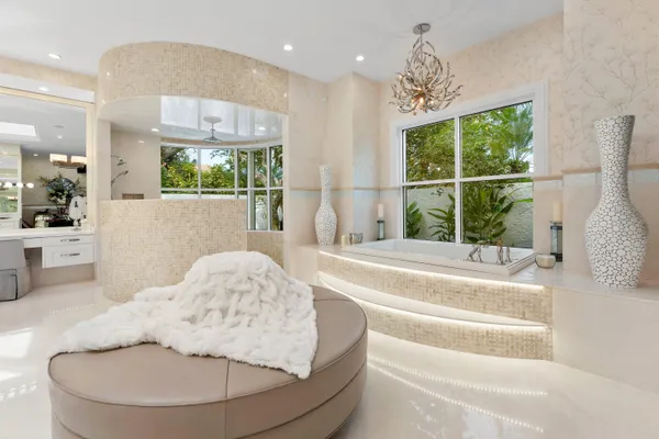 a view of a house with swimming pool and a yard