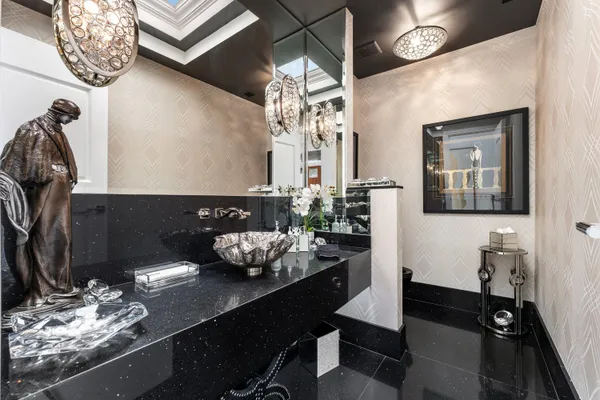 front view of a house with a yard table and chairs