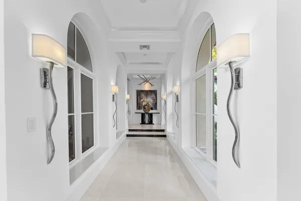 a living room with fireplace furniture and decor