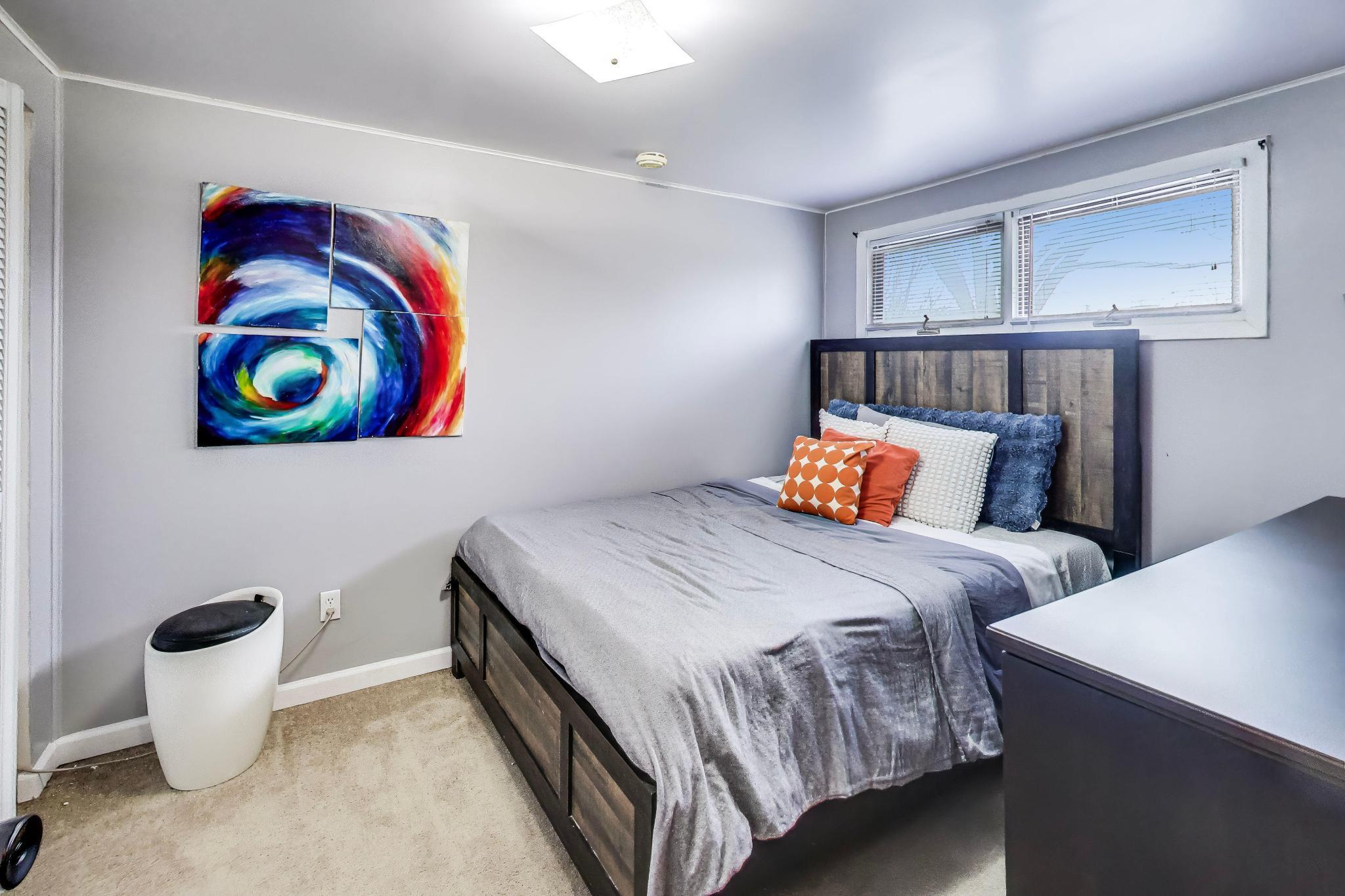 453 Chestnut Street Valparaiso, IN 46385 - Photo 29 of 47 a bedroom with a bed and a painting on the wall