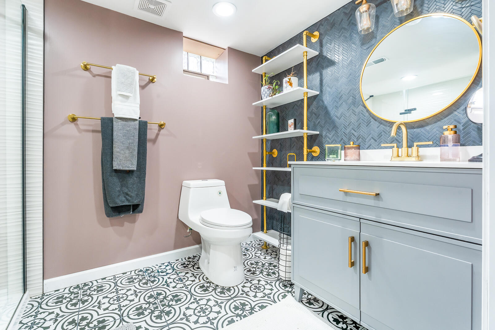 453 Chestnut Street Valparaiso, IN 46385 - Photo 38 of 47 a bathroom with a toilet sink vanity and mirror