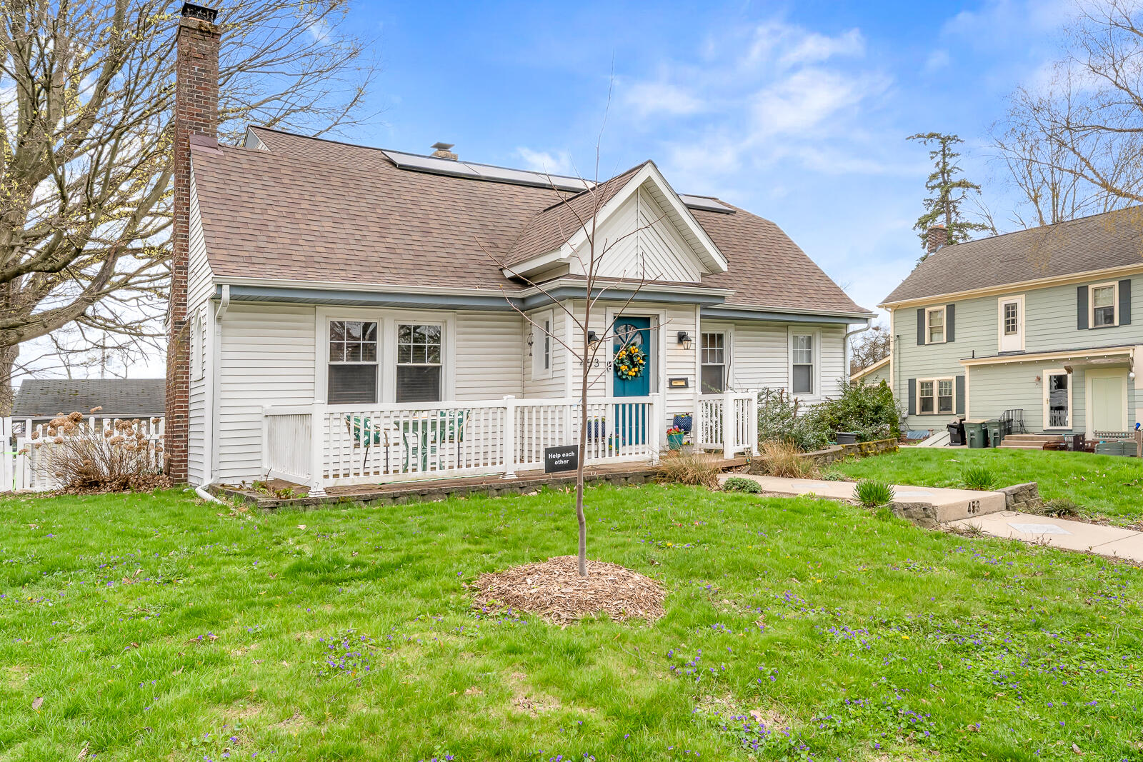 453 Chestnut Street Valparaiso, IN 46385 - Photo 47 of 47 a front view of a house with a yard and garage