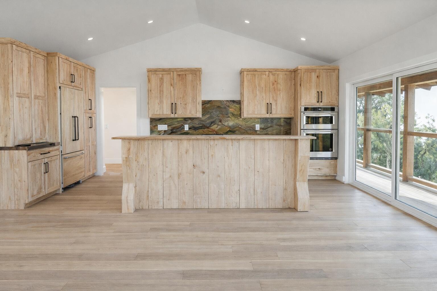 2111 Refugio Road Goleta, CA 93117 - Photo 7 of 22 a kitchen with stainless steel appliances granite countertop a refrigerator and cabinets