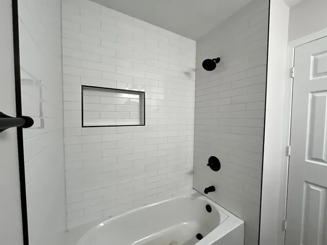 a bathroom with a bathtub