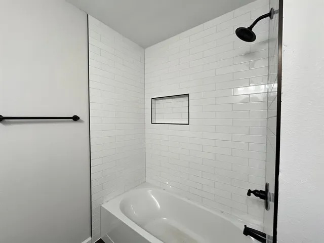 a bathroom with a bathtub