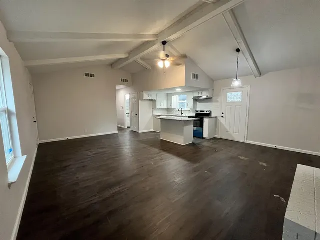 a view of a kitchen and a sink