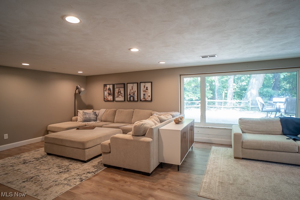 8283 Montello Road Independence, OH 44131 - Photo 21 of 41 Living room with hardwood / wood-style flooring