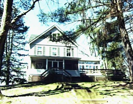 144 Wire Mill Road Stamford, CT 06903 - Photo 1 of 1 a front view of a house with a yard