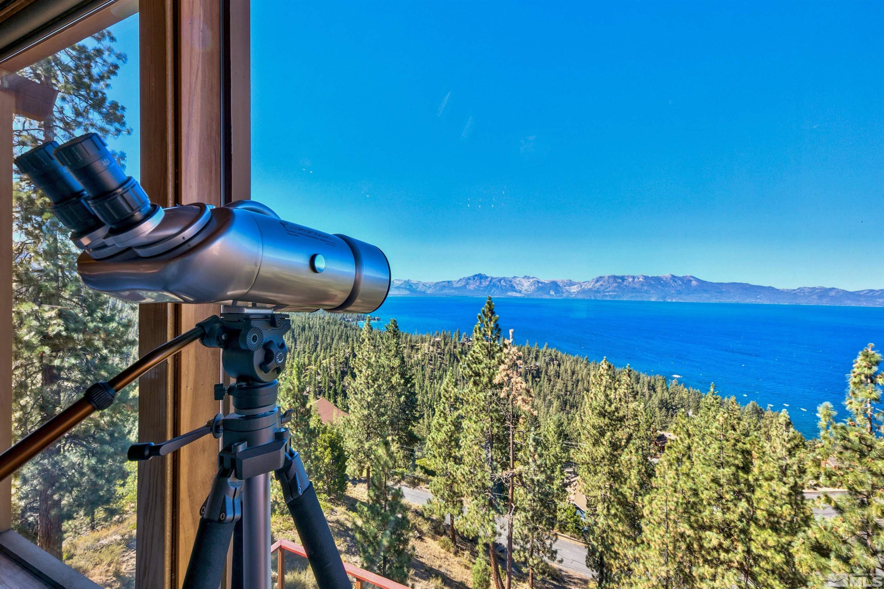 a view of a balcony with chairs