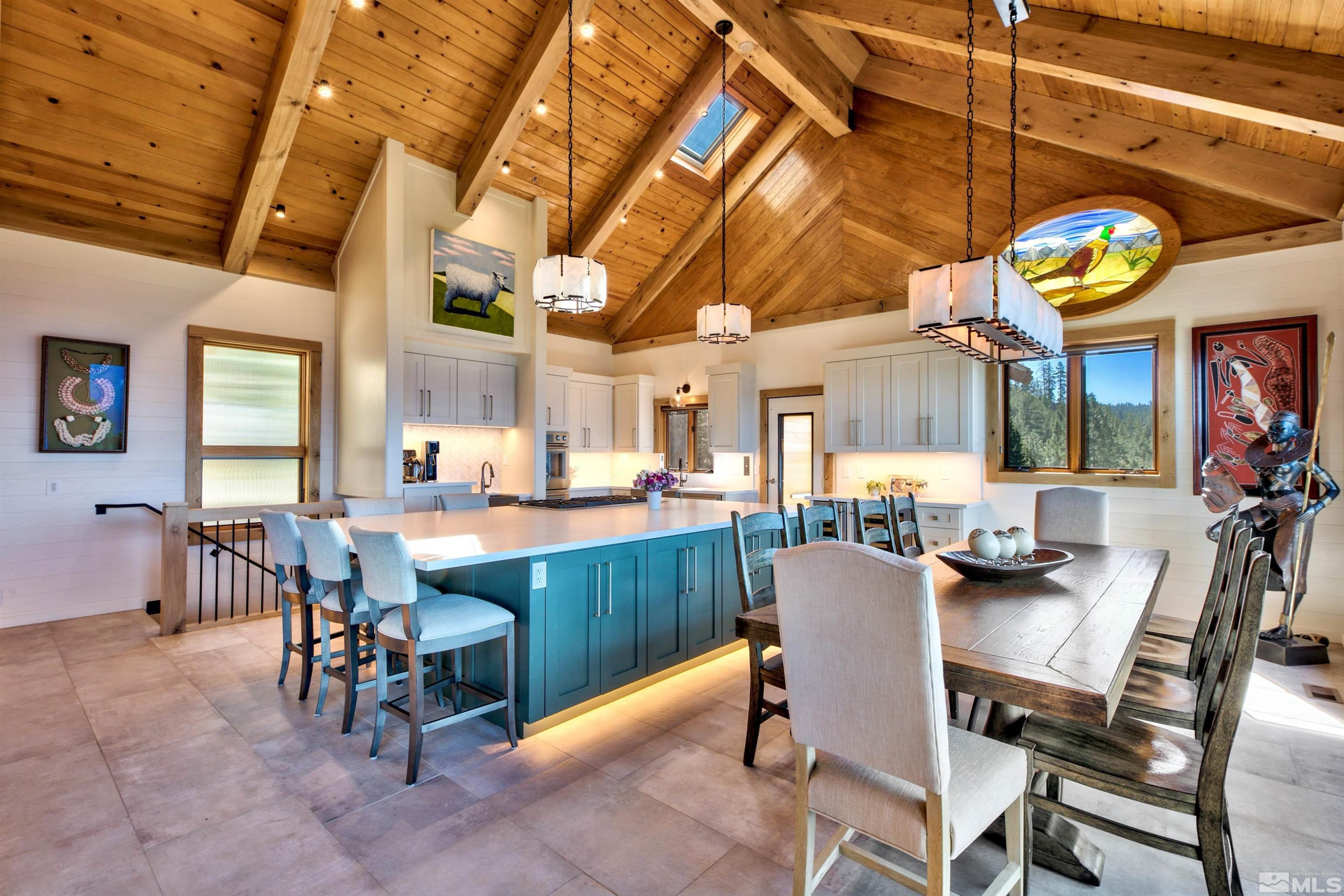 319 Pheasant Drive Glenbrook, NV 89413 - Photo 11 of 40 a dining area with furniture and a large window