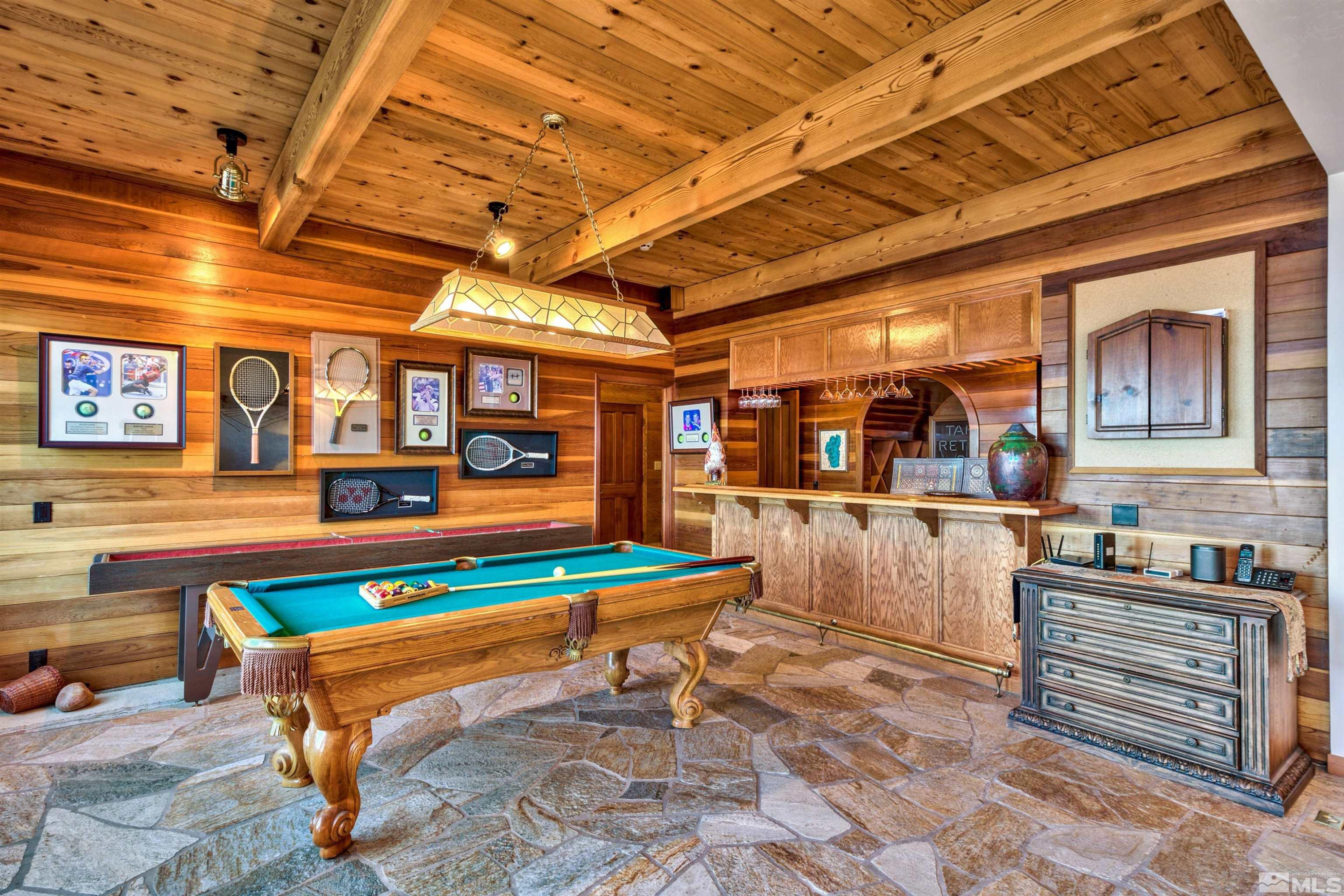 319 Pheasant Drive Glenbrook, NV 89413 - Photo 20 of 40 a room with lots of furniture and a table