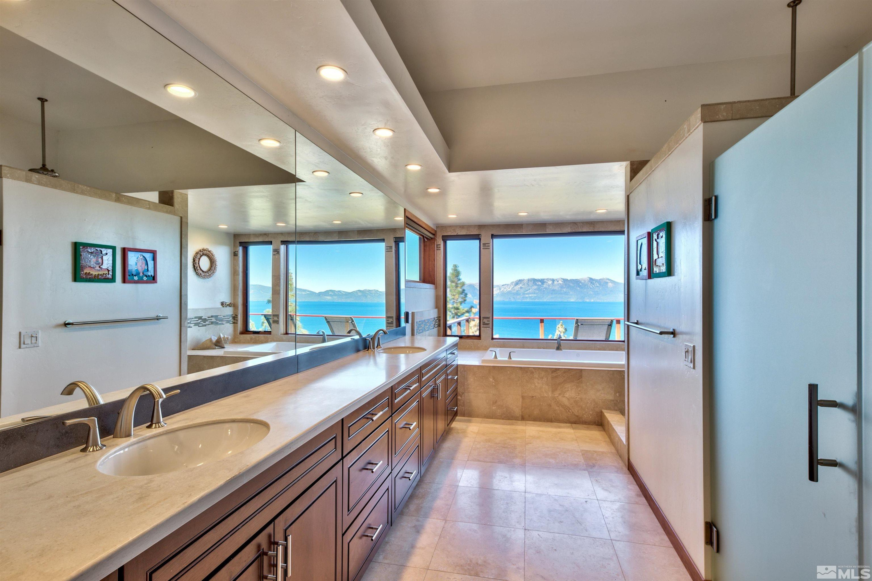319 Pheasant Drive Glenbrook, NV 89413 - Photo 23 of 40 a large hall with stainless steel appliances granite countertop a sink and cabinets