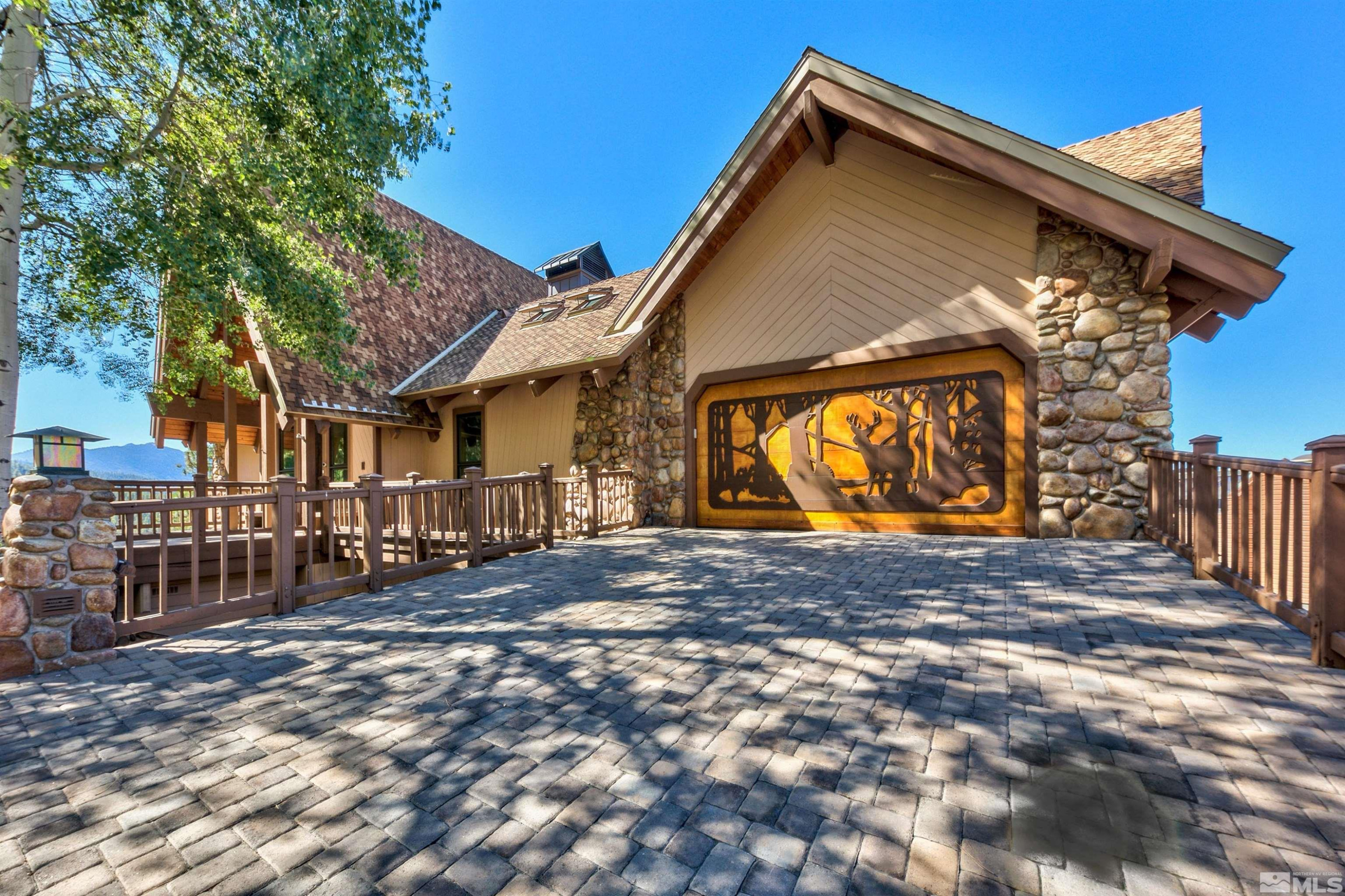 319 Pheasant Drive Glenbrook, NV 89413 - Photo 37 of 40 a view of outdoor space and front view of a house