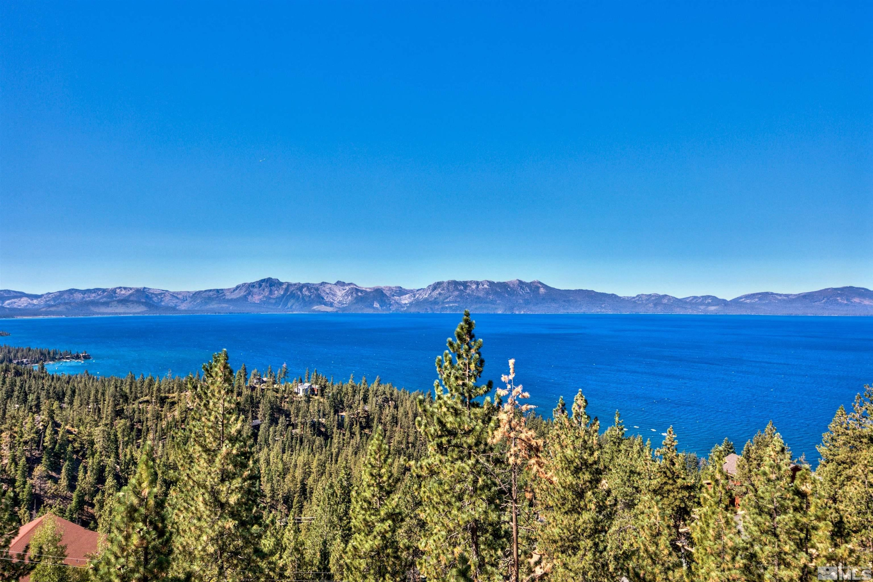 319 Pheasant Drive Glenbrook, NV 89413 - Photo 39 of 40 a view of a lake with a mountain in the background