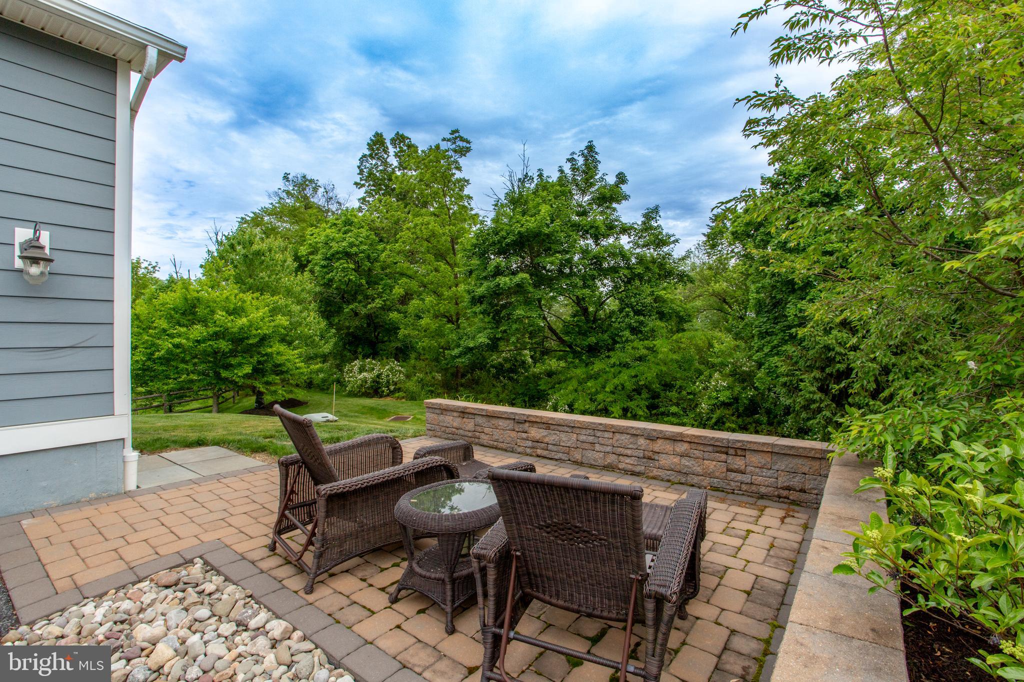 4682 Plough Tavern Road Doylestown, PA 18902 - Photo 40 of 42 a view of an outdoor sitting area with chairs
