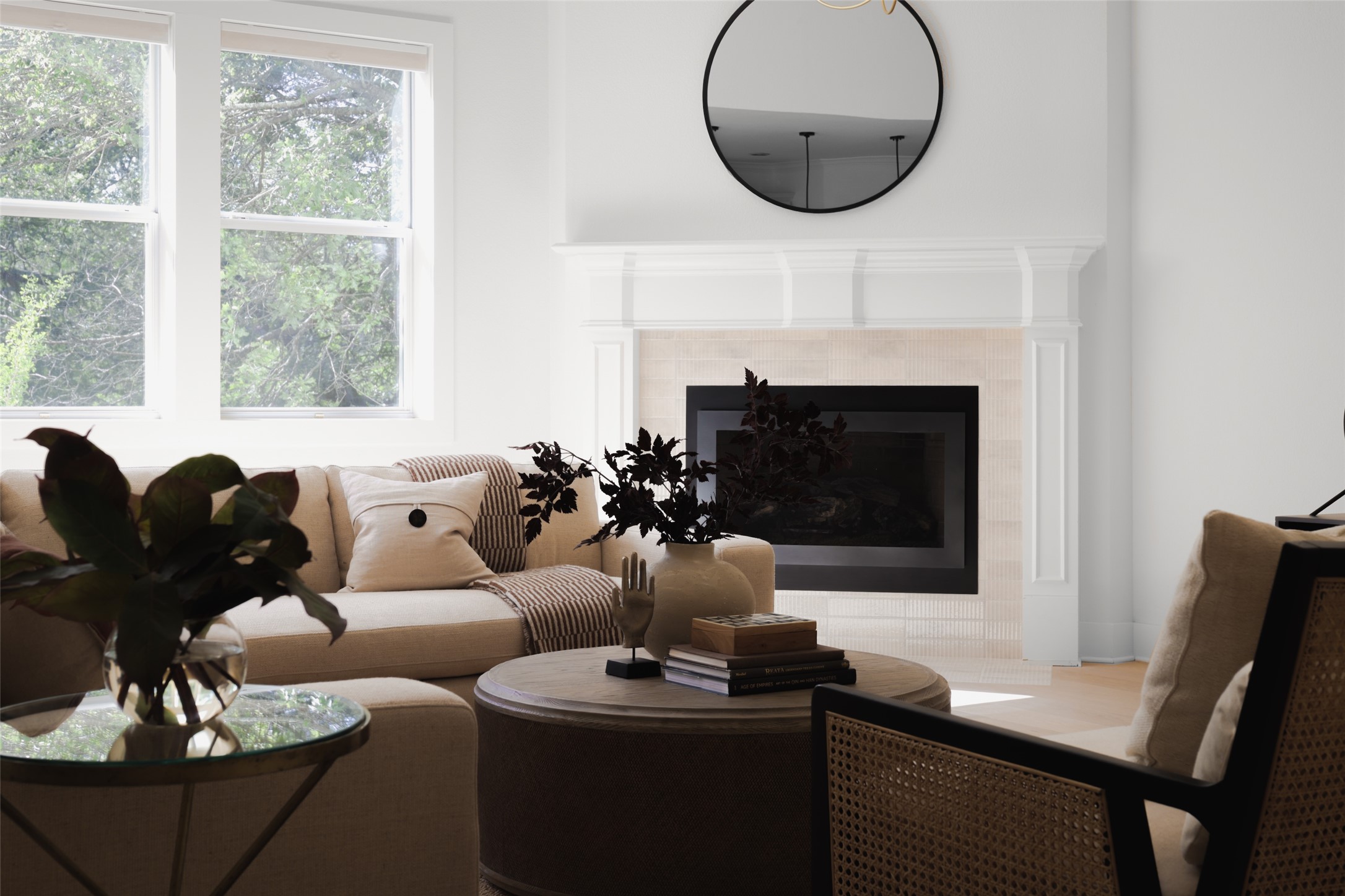 18 North Peak Road Austin, TX 78746 - Photo 1 of 1 a living room with furniture a fireplace and a large window