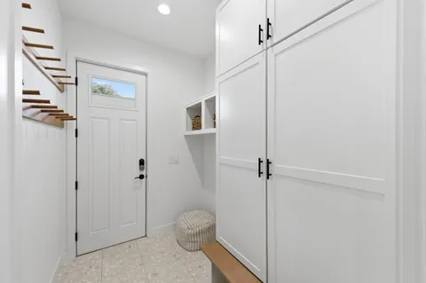 a view of a hallway with closet area