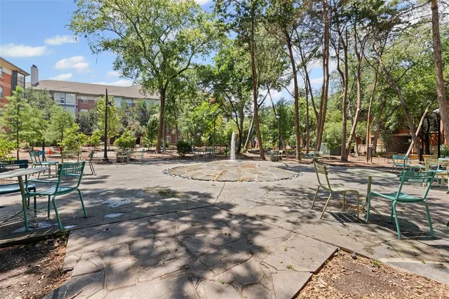 a view of a building with sitting area