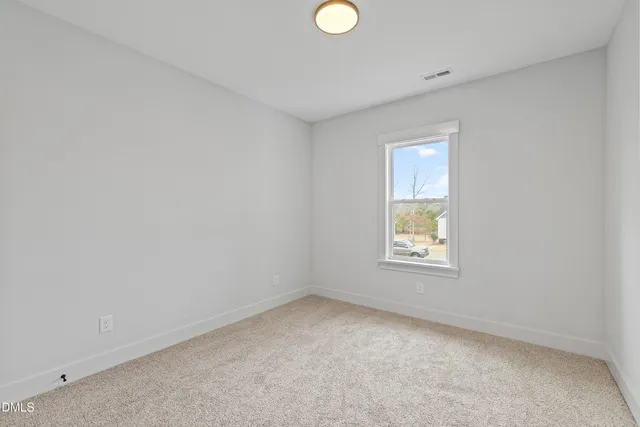 a kitchen with sink and cabinets