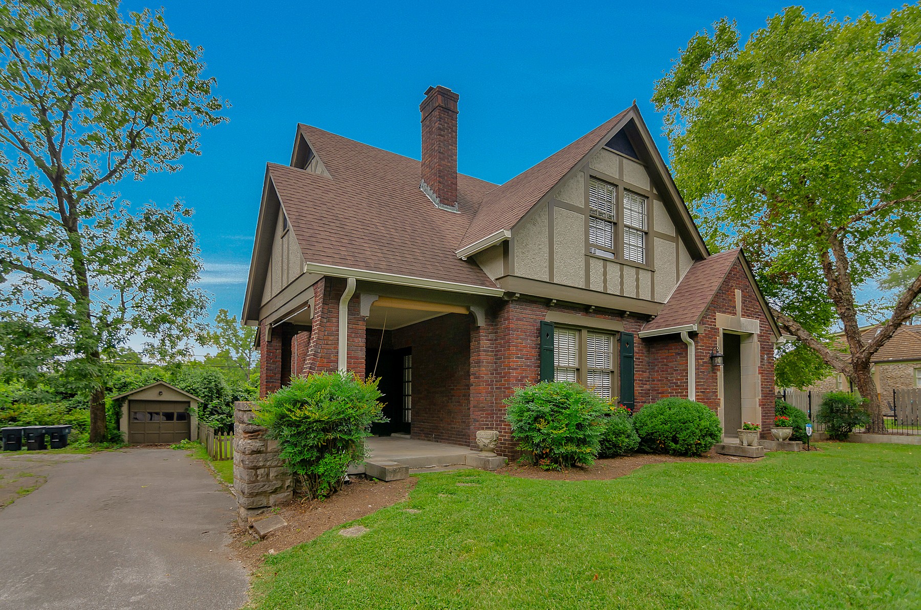 115 Cherokee Road Nashville, TN 37205 - Photo 2 of 36 a front view of a house with a yard