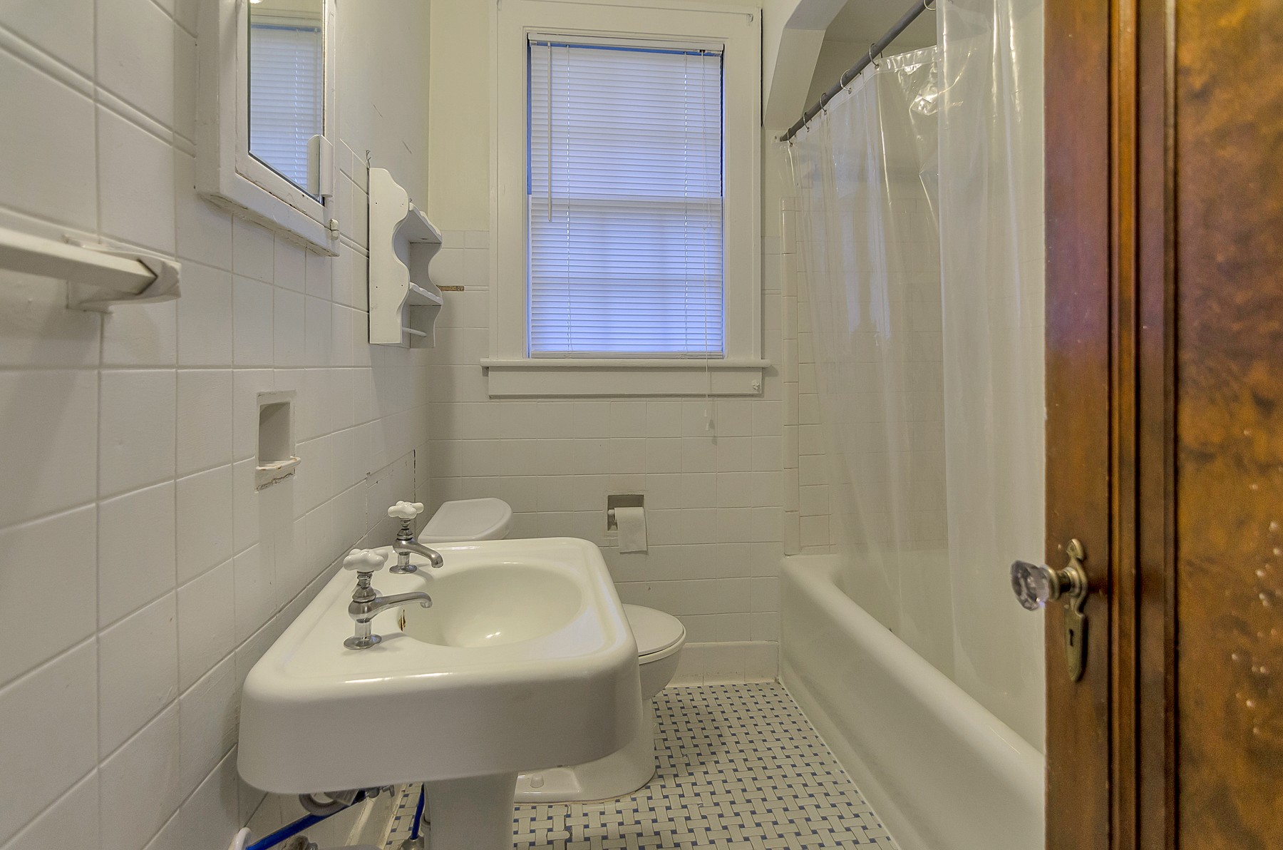 115 Cherokee Road Nashville, TN 37205 - Photo 34 of 36 a bathroom with a sink a toilet and shower