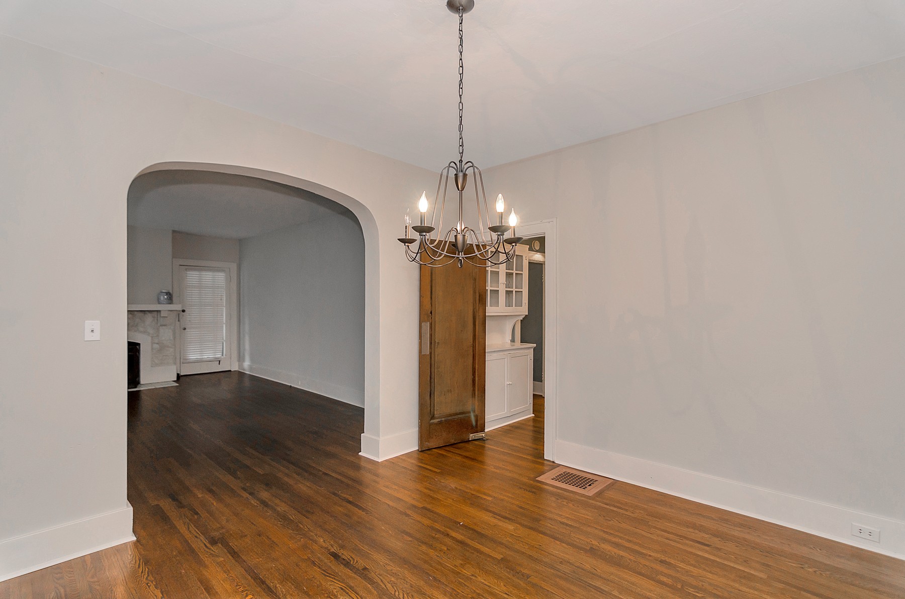 115 Cherokee Road Nashville, TN 37205 - Photo 9 of 36 a view of a room with wooden floor chandelier and a window