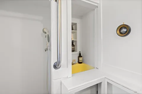 a view of an empty room with a window