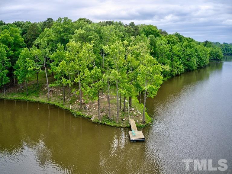 Ivy Hill Road Clarksville, VA 23927 - Photo 12 of 25 an aerial view of a house with a yard and lake view