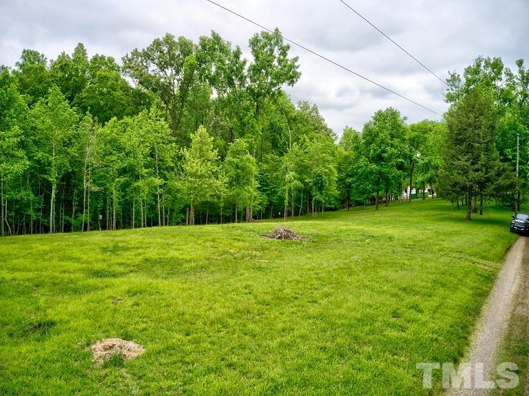 Ivy Hill Road Clarksville, VA 23927 - Photo 14 of 25 a view of a grassy field with trees