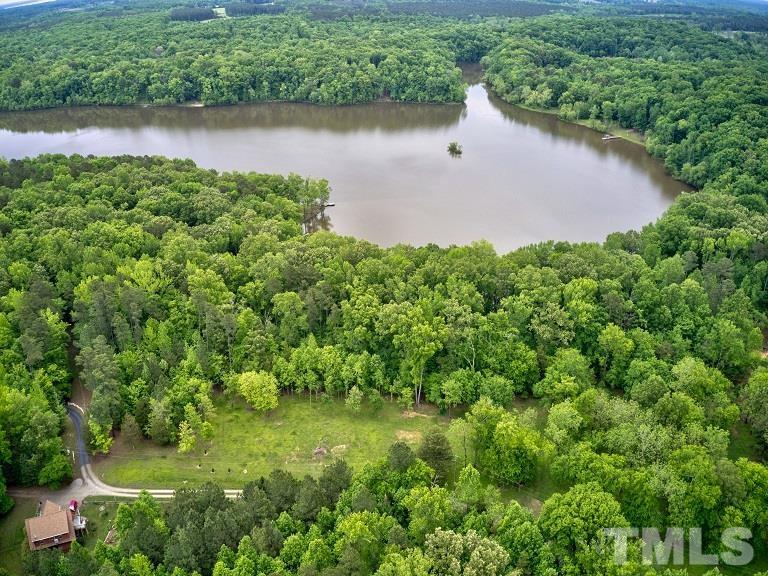 Ivy Hill Road Clarksville, VA 23927 - Photo 9 of 25 an aerial view of a house with a yard and lake view