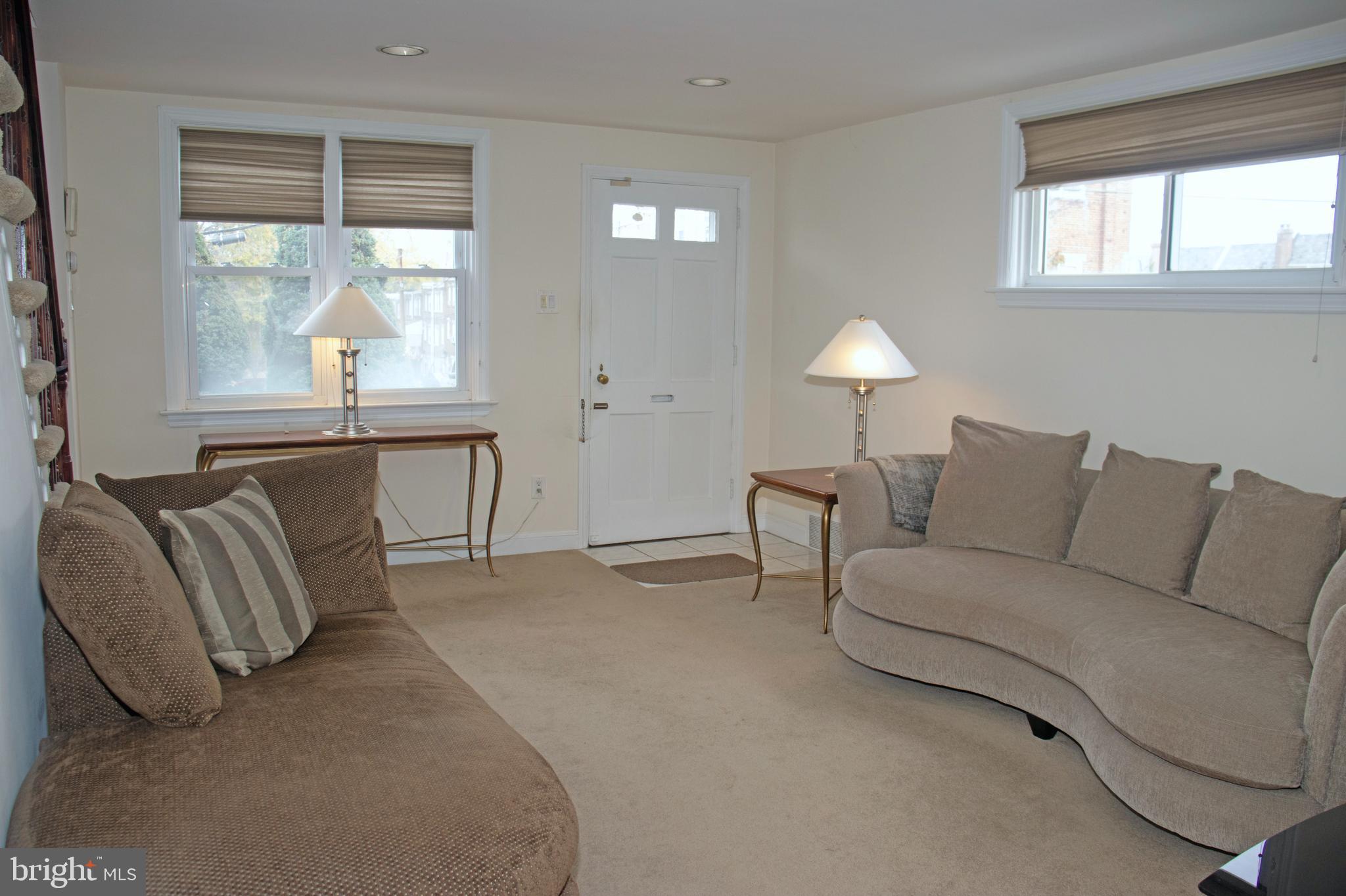 858 Fairfax Road Drexel Hill, PA 19026 - Photo 3 of 20 a living room with furniture and a window