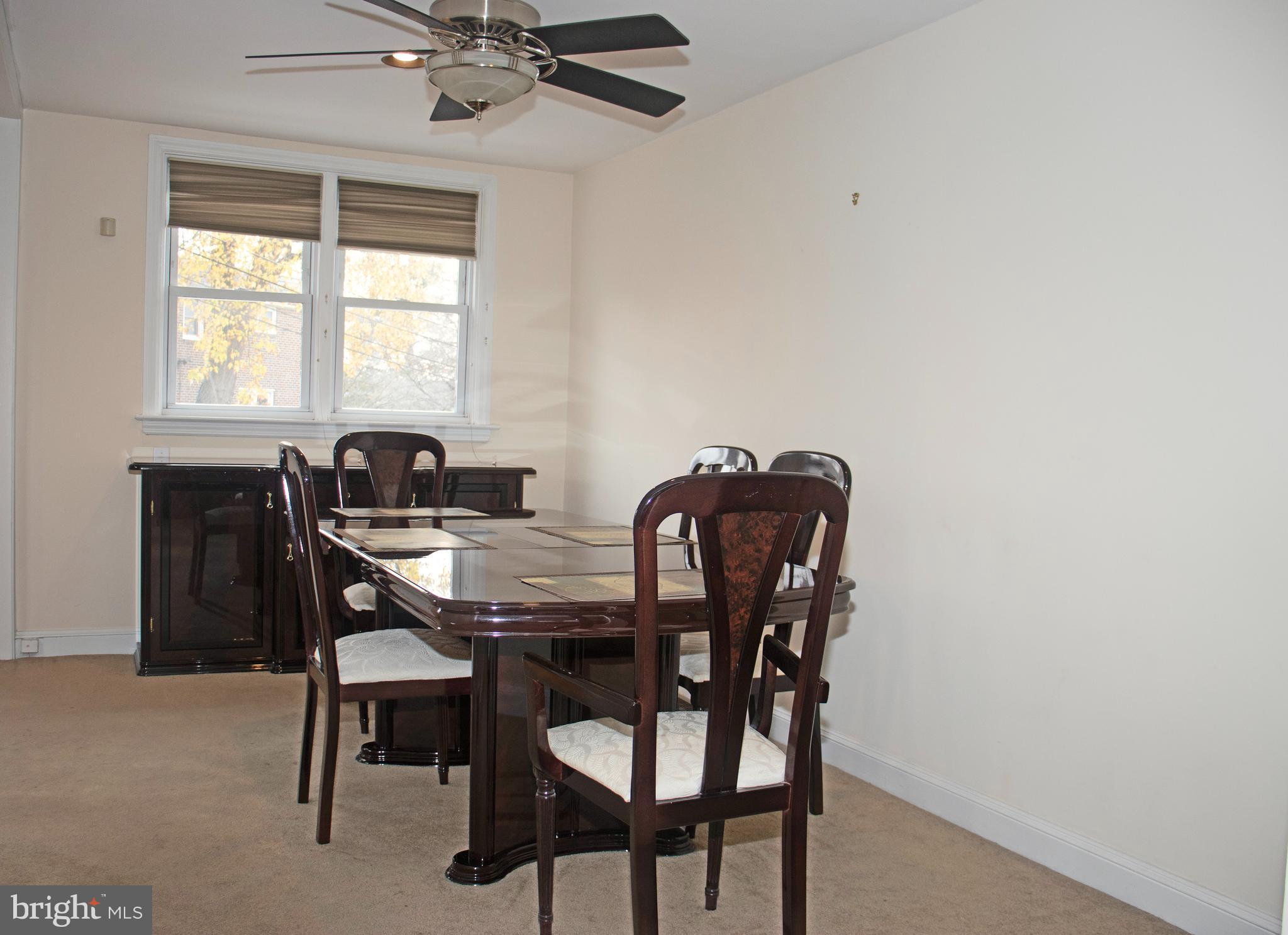 858 Fairfax Road Drexel Hill, PA 19026 - Photo 5 of 20 a view of a dining room with a table and chairs