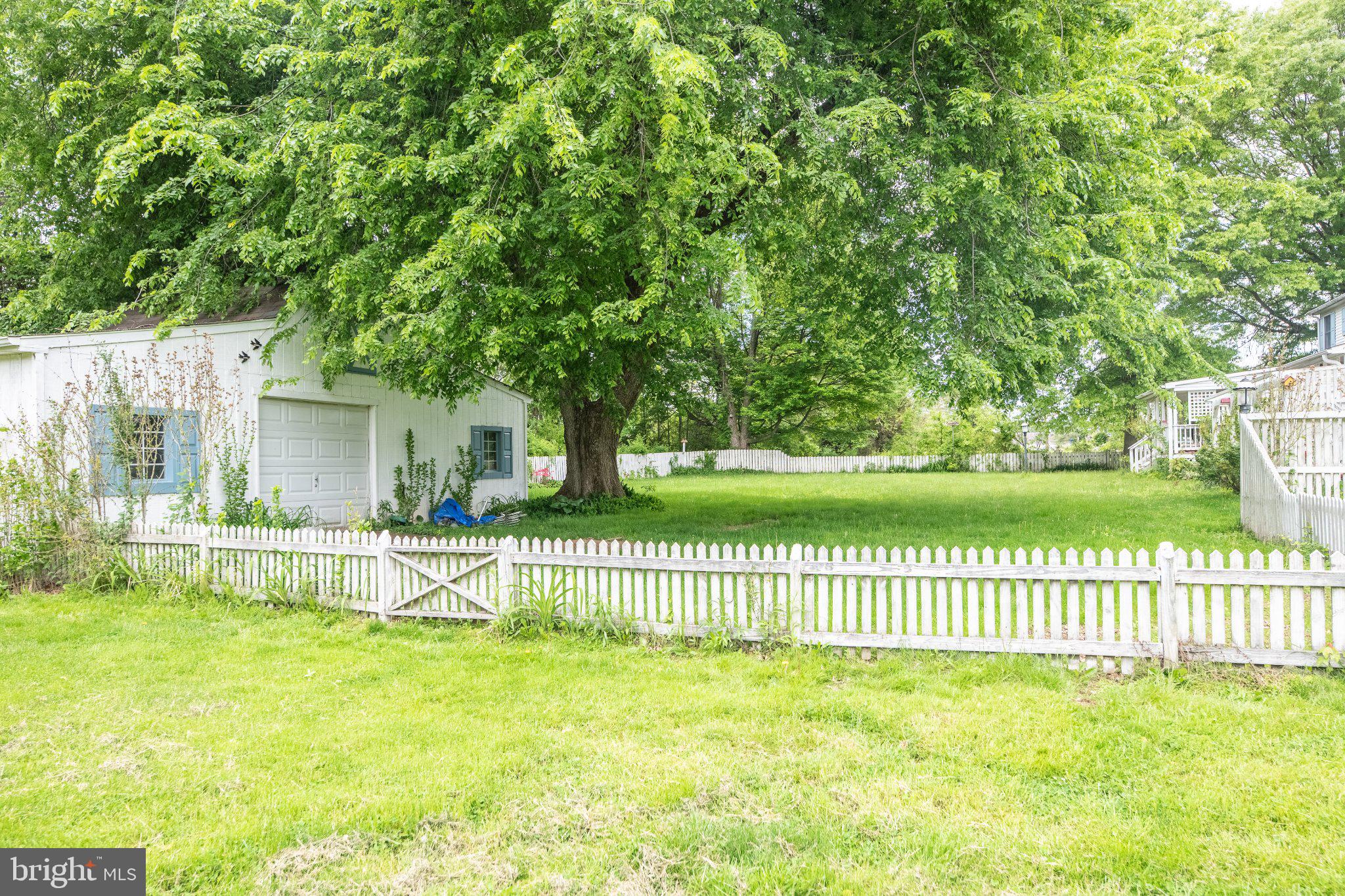 57 Diverty Road Pennington, NJ 08534 - Photo 74 of 86 Charming yard with lush greenery.