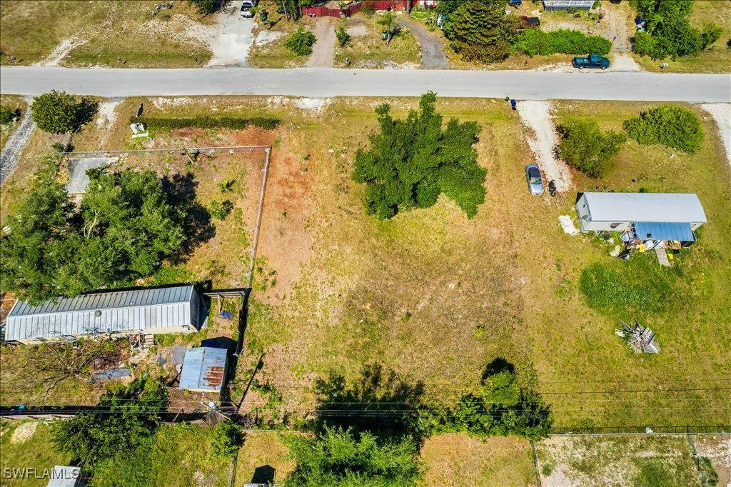 8355 Nault Road North Fort Myers, FL 33917 - Photo 7 of 8 a view of swimming pool from a balcony