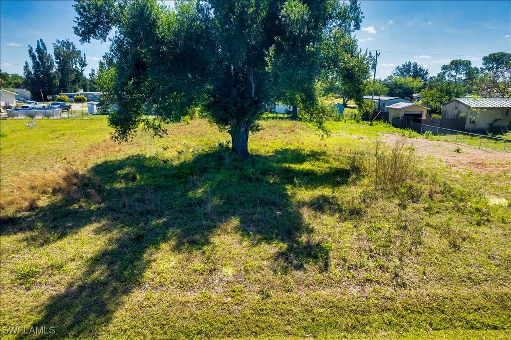 8355 Nault Road North Fort Myers, FL 33917 - Photo 8 of 8 a view of a yard with swimming pool