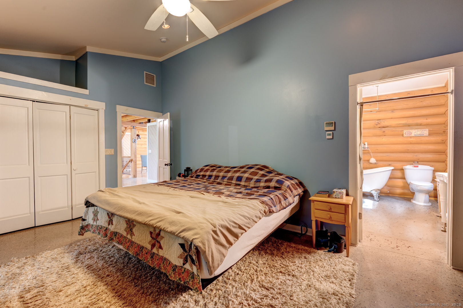 204 Old Blue Hills Road Durham, CT 06422 - Photo 17 of 24 a bedroom with a bed and a dresser next to a window