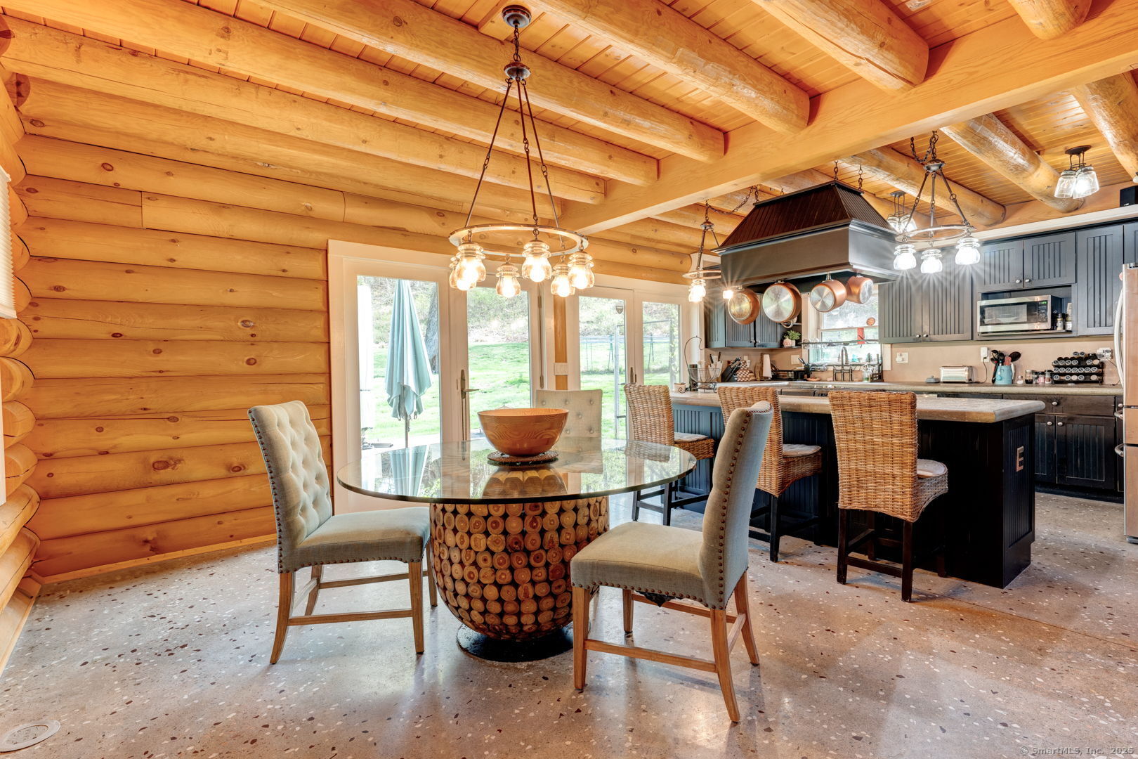 204 Old Blue Hills Road Durham, CT 06422 - Photo 7 of 24 a dining room with a wooden table and chairs