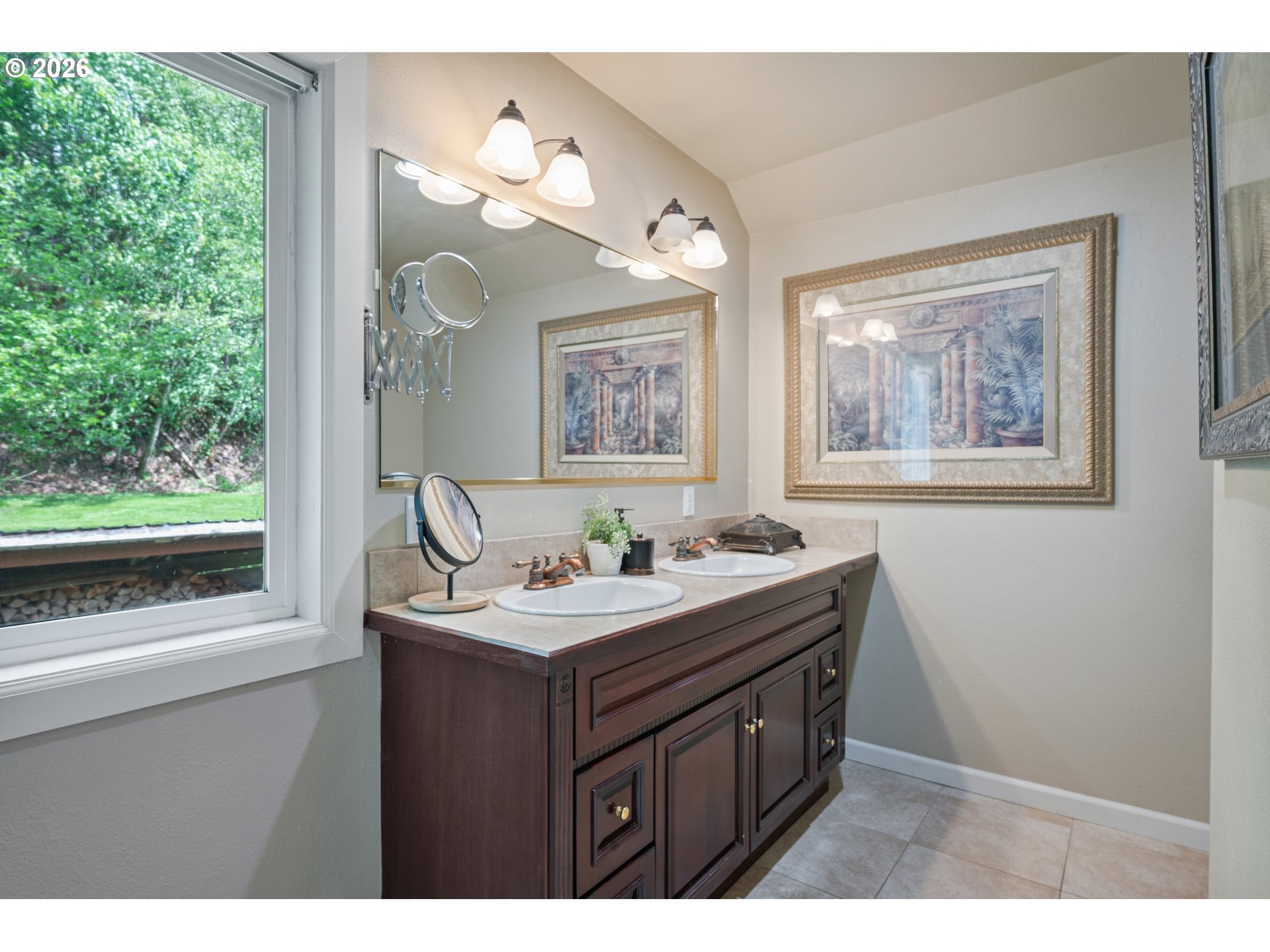 1304 Coal Creek Road Longview, WA 98632 - Photo 11 of 44 a bathroom with a granite countertop sink a large mirror and a window