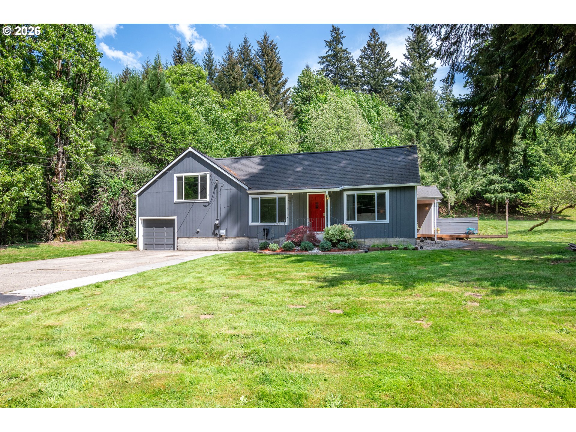 1304 Coal Creek Road Longview, WA 98632 - Photo 12 of 44 a front view of a house with a yard