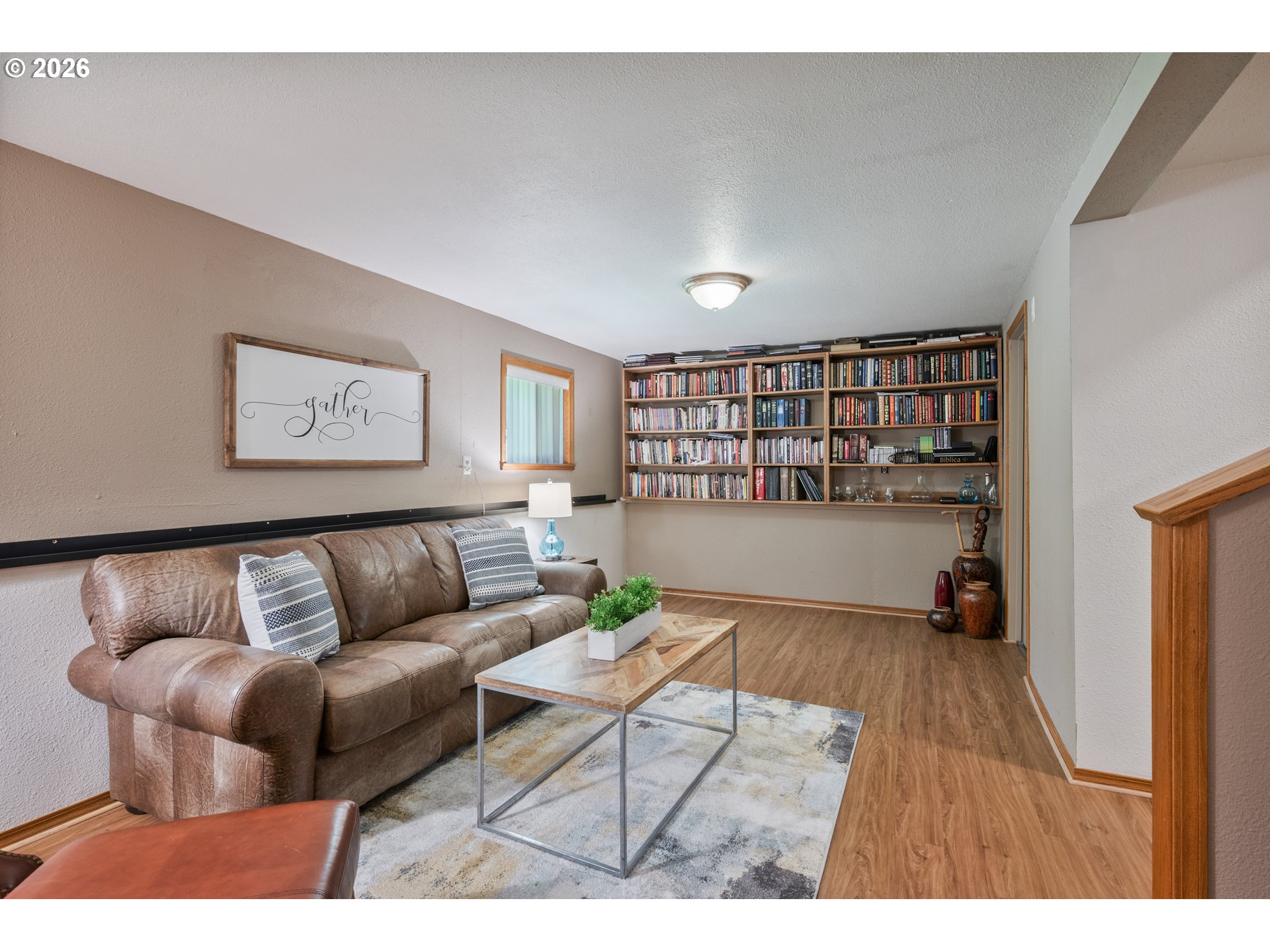 1304 Coal Creek Road Longview, WA 98632 - Photo 13 of 44 a living room with furniture and a wooden floor