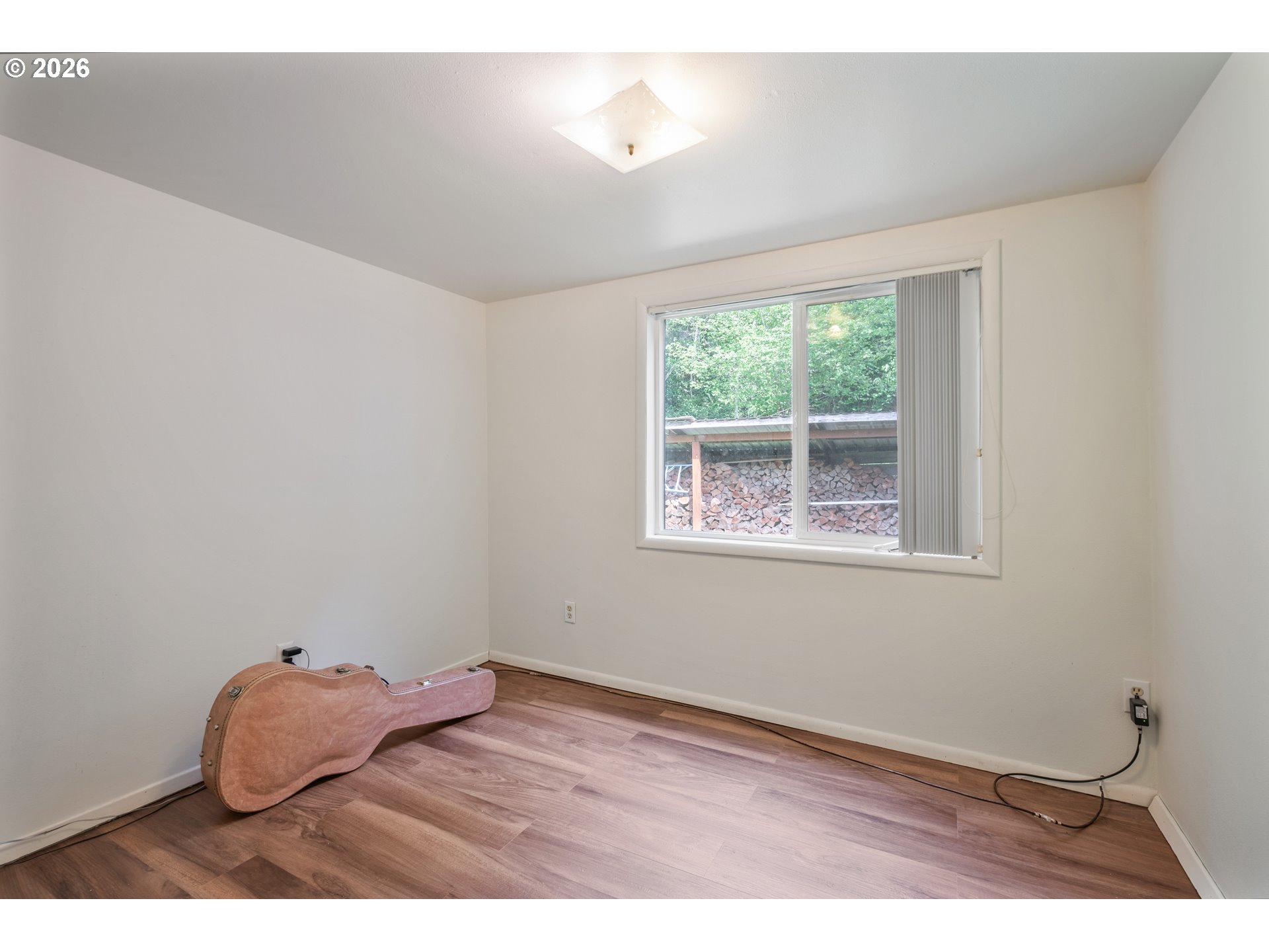 1304 Coal Creek Road Longview, WA 98632 - Photo 20 of 44 a room with window and hardwood floor