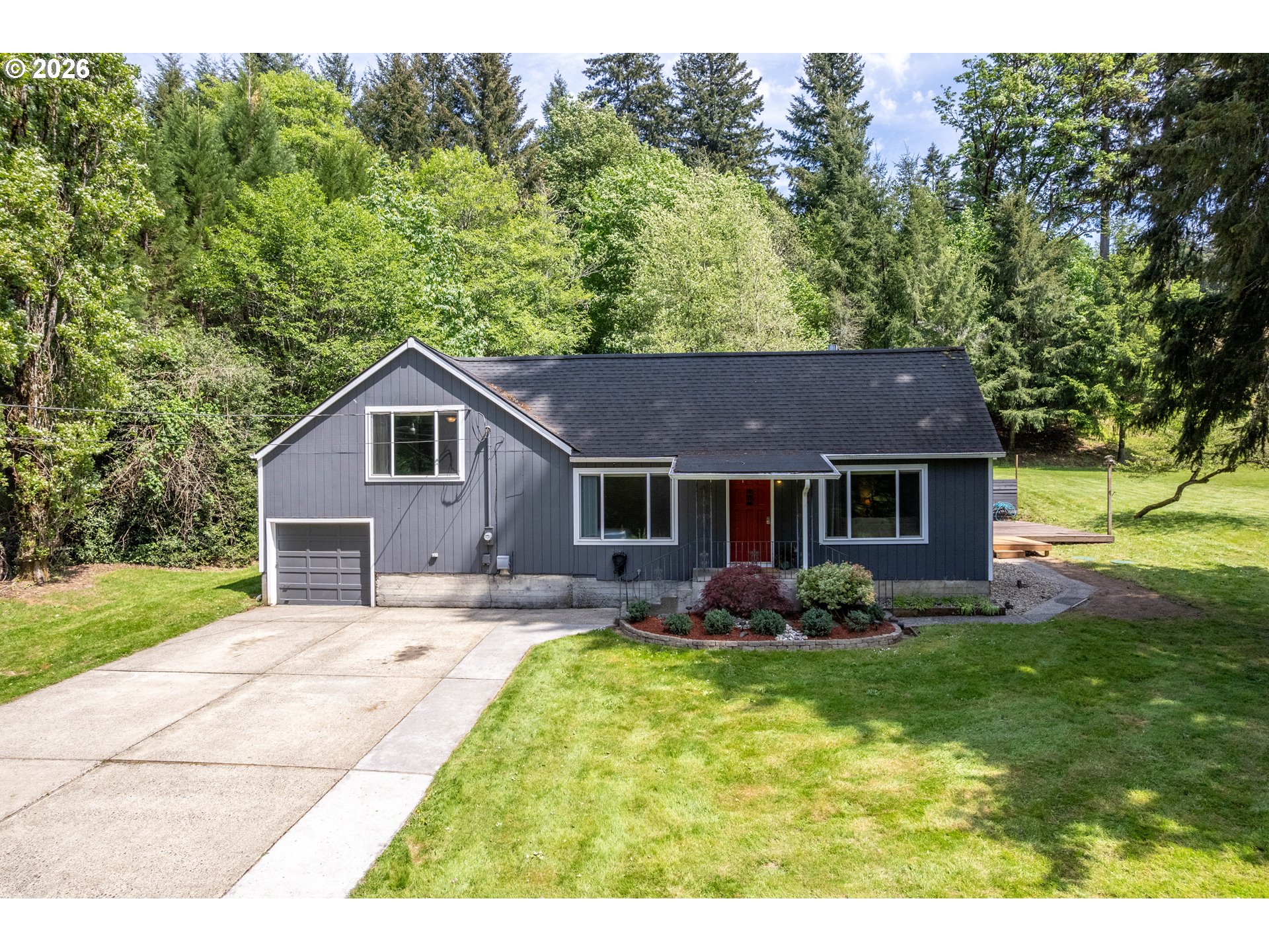 1304 Coal Creek Road Longview, WA 98632 - Photo 32 of 44 a view of a yard in front of house