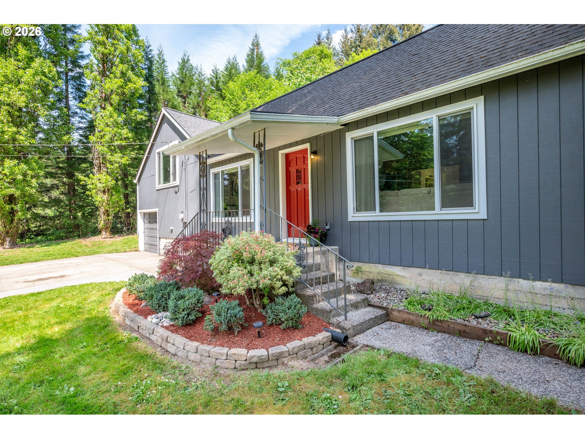 1304 Coal Creek Road Longview, WA 98632 - Photo 34 of 44 a front view of a house with garden
