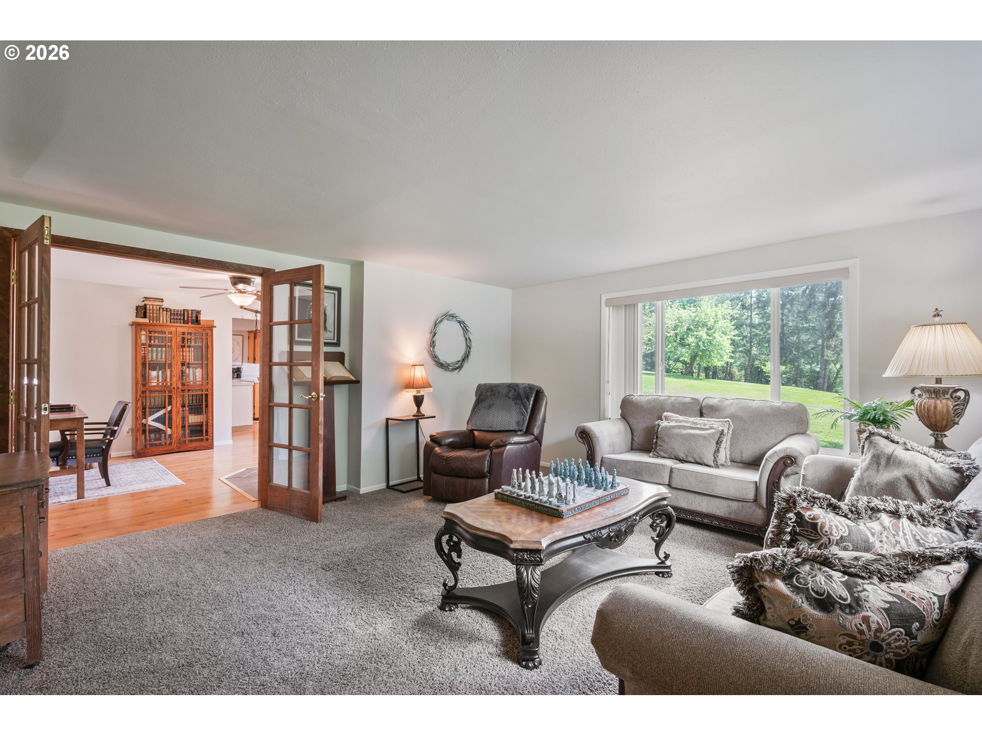 1304 Coal Creek Road Longview, WA 98632 - Photo 43 of 44 a living room with furniture and a large window