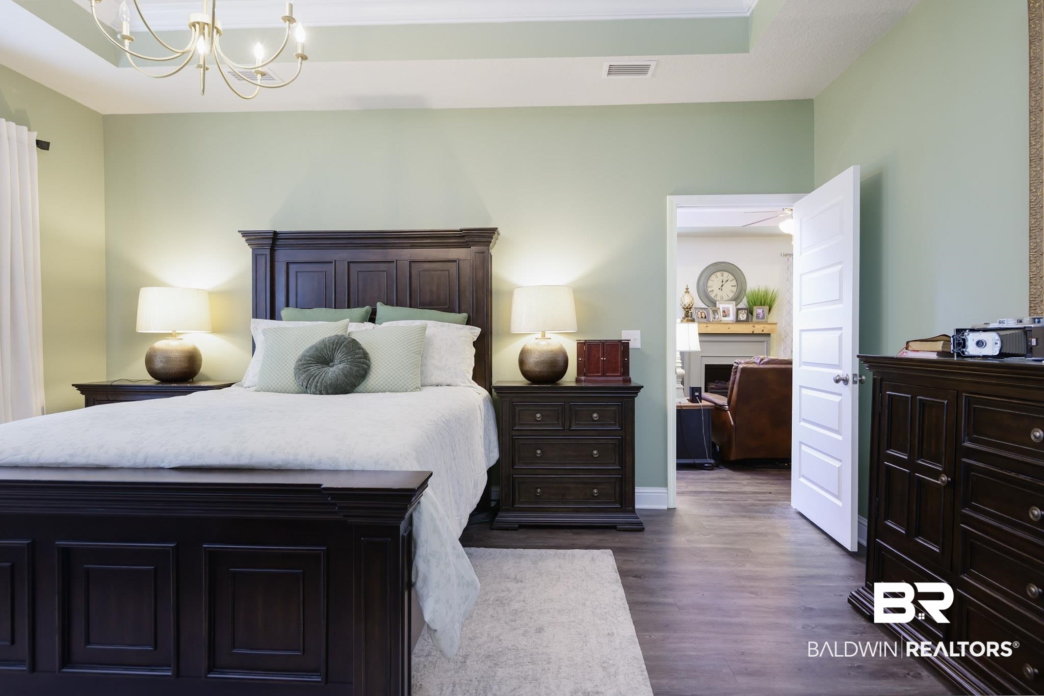 31751 Kestrel Loop Daphne, AL 36527 - Photo 13 of 21 Bedroom featuring suspended lighting and dark wood-style flooring