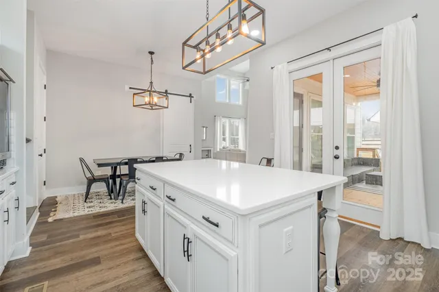 a very nice looking dining room with a table and chairs