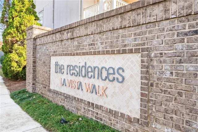 a wall with sign board