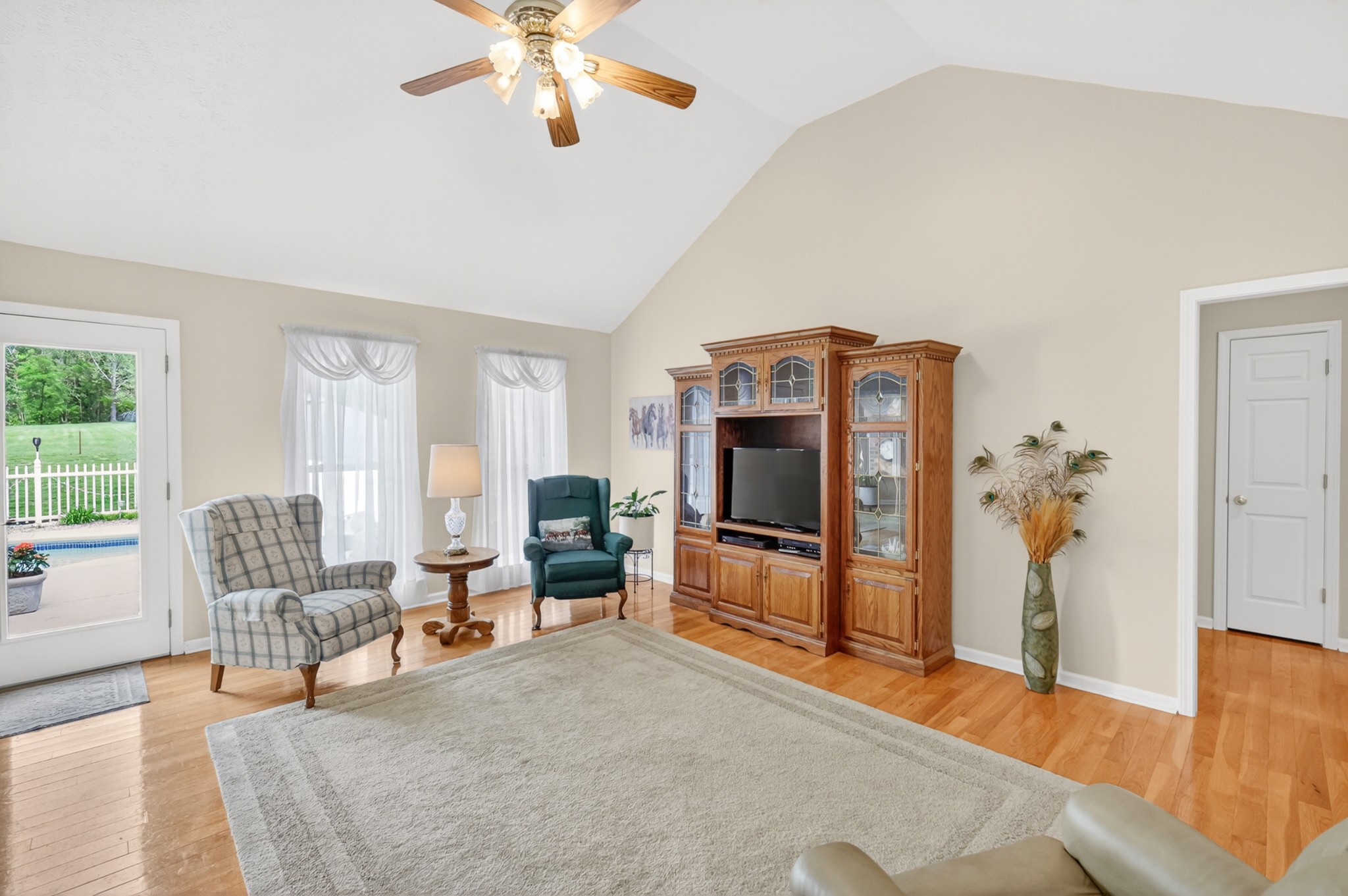 590 Allisona Road Eagleville, TN 37060 - Photo 9 of 55 a living room with furniture a flat screen tv and a large window