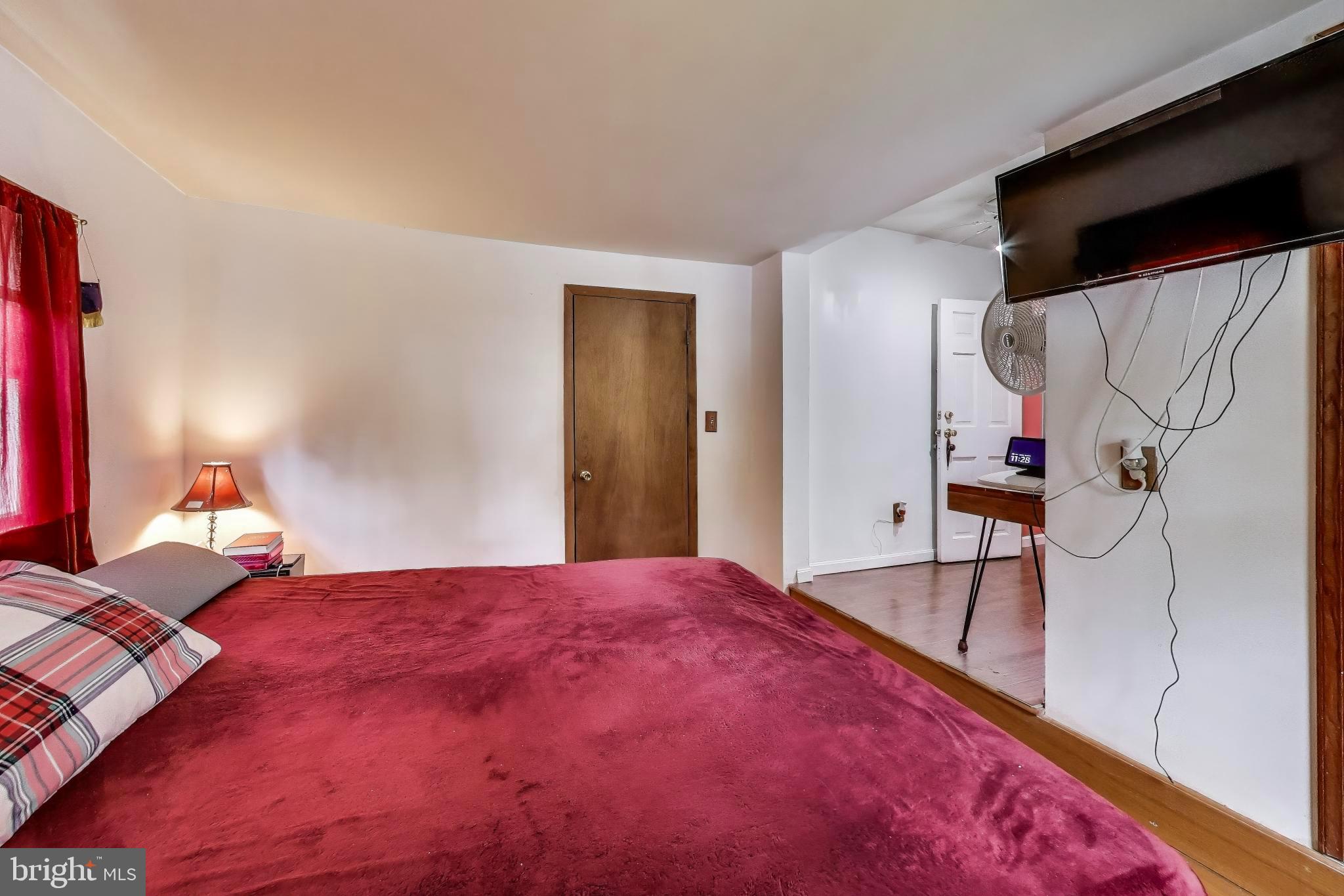 9211 Fowler Lane Lanham, MD 20706 - Photo 19 of 50 a bed room with a bed and a closet