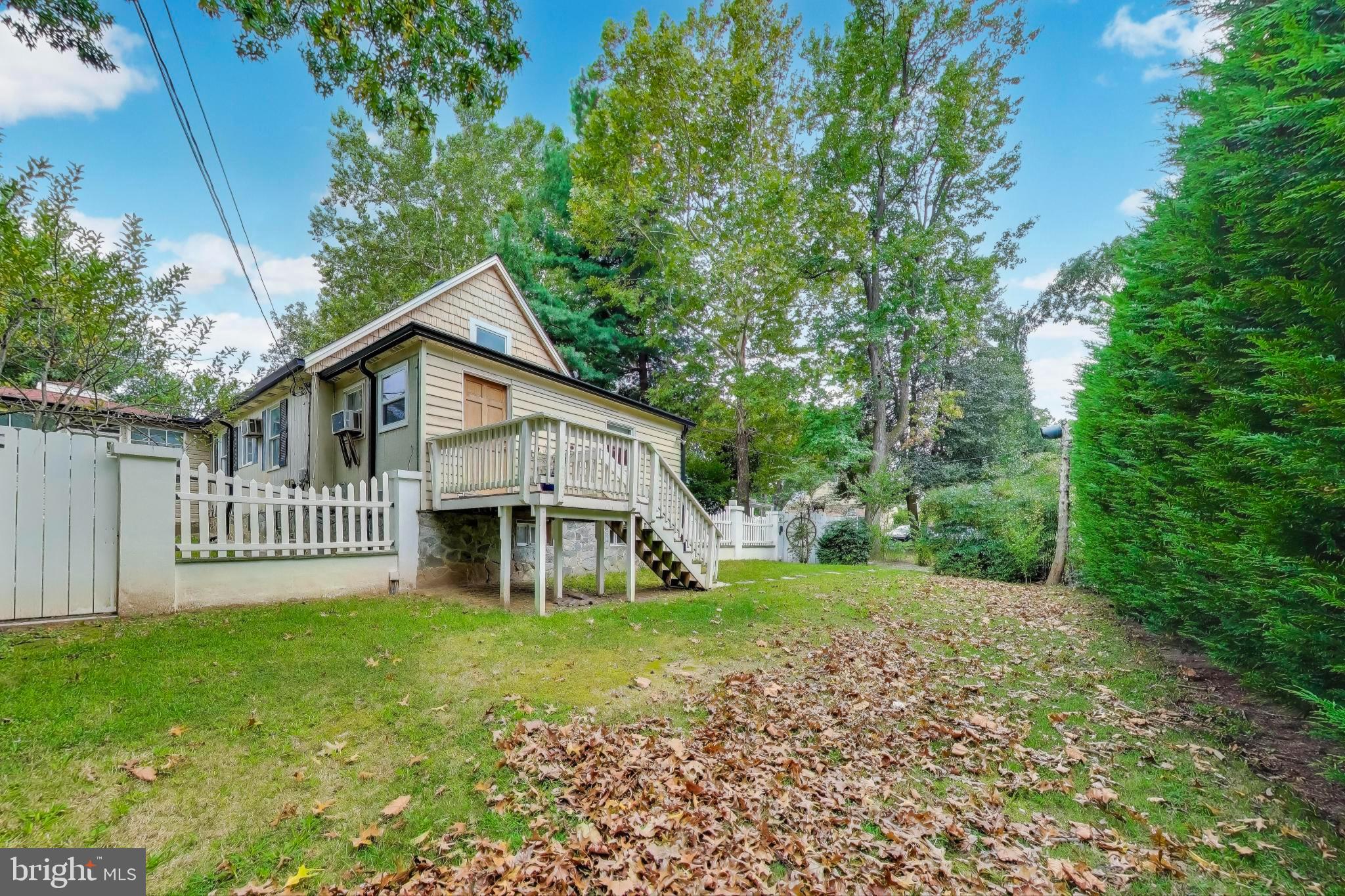 9211 Fowler Lane Lanham, MD 20706 - Photo 2 of 50 a view of a house with a yard and porch